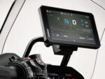 CHIGEE AIO-6 LTE motorcycle display fitted above a BMW motorcycle dashboard